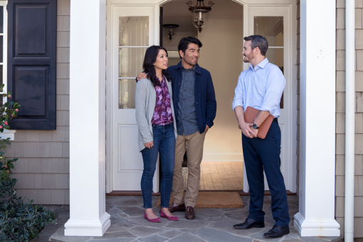 real estate agent showing a home