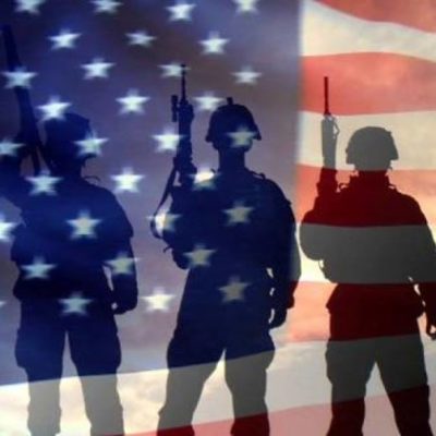 american flag with shadows of soldiers