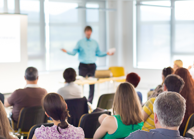 man teaching a real estate class