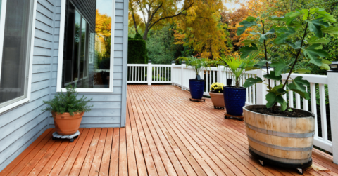 Back porch of home with wood slat flooring installed