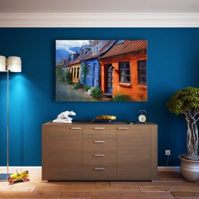 photo of blue wall with dresser and print on wall
