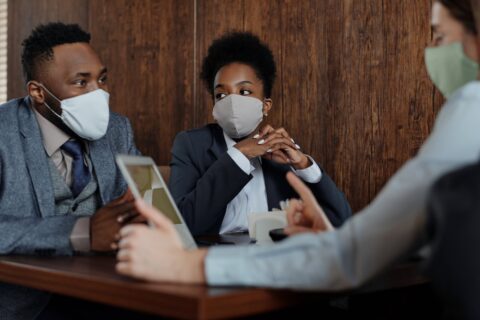 people meeting with masks on